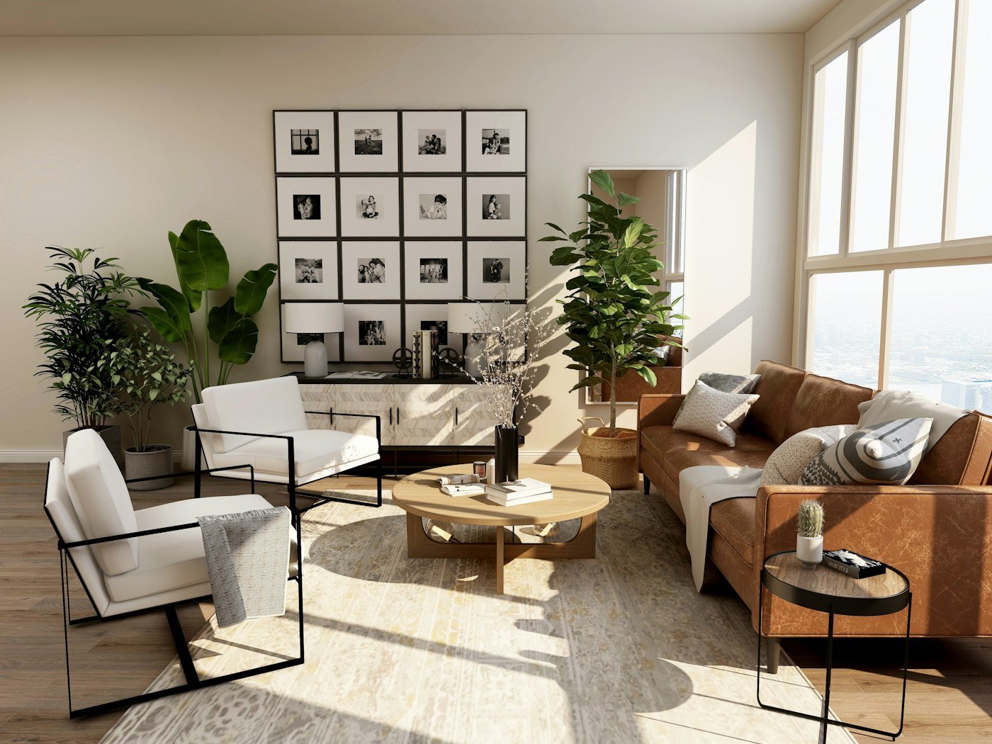 A brown leather sofa, two white chairs, a round wood table, and a wall of small photographs